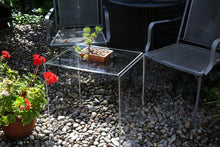 acrylic side table in the garden