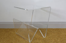 Clear acrylic side end table with  magazine rack below